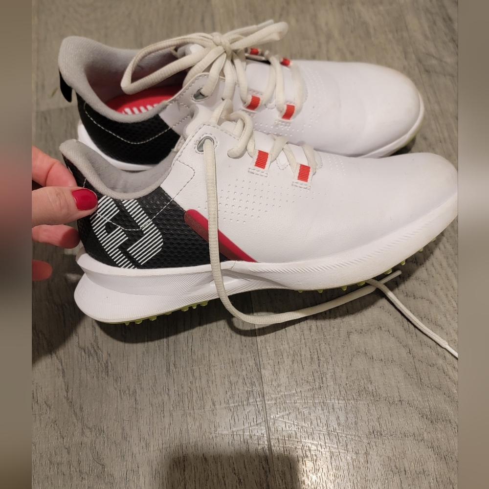 FootJoy Youth White and Black Sneakers with Red Accents - Picture 2 of 5